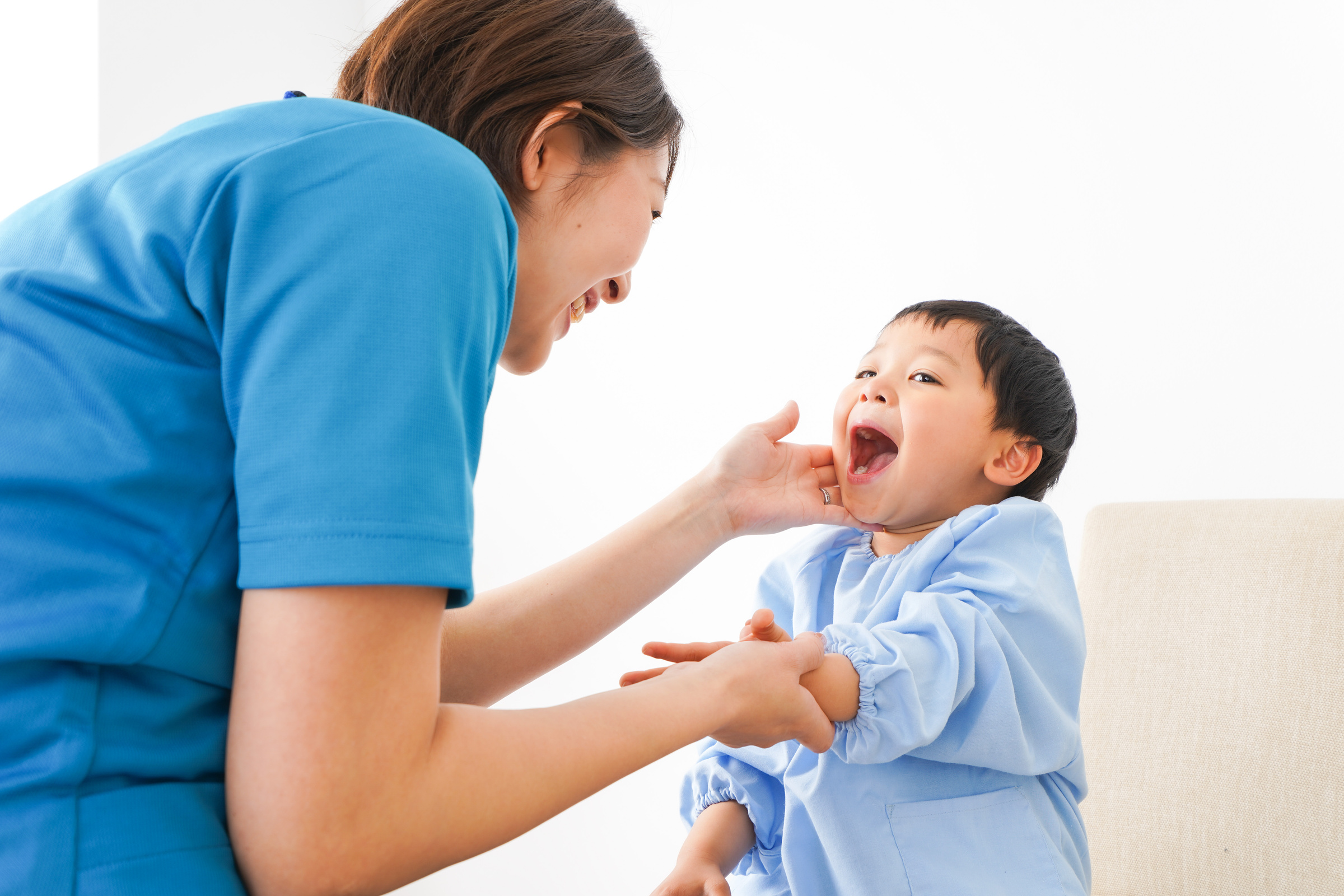 Young nurse care for child
